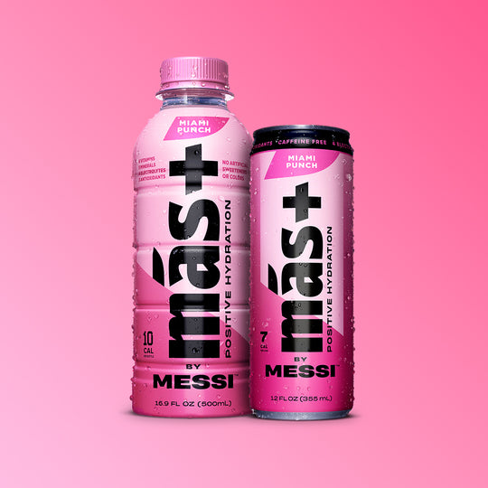 Brightly colored pink Más+ by Messi drinks — Miami Punch flavor — shown side by side on a bold gradient backdrop.