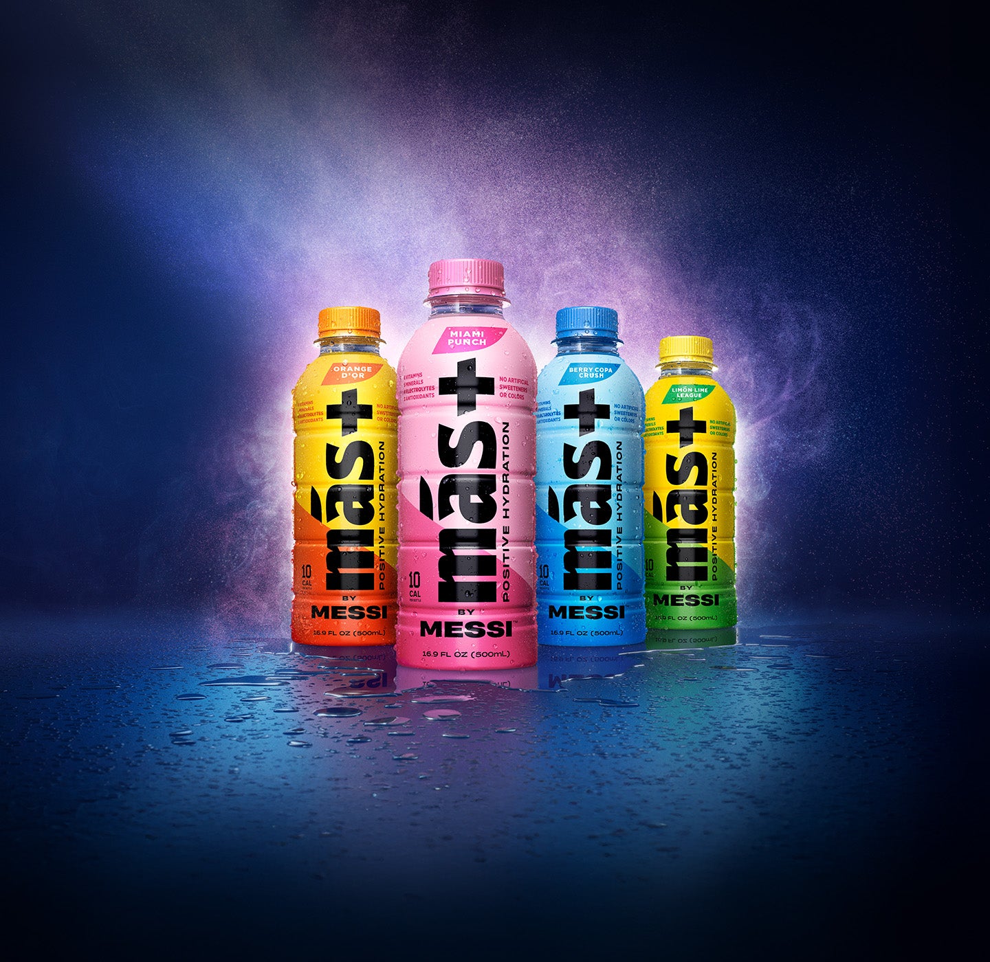 Four bottles of "ás+ Positive Hydration by Messi" sports drinks in different flavors and colors are displayed against a dark, misty background with blue and purple lighting. The flavors include "Miami Punch" (pink), "Berry Copa Crush" (blue), "Orange D'OR" (orange), and "Lemon Lime League" (green). The bottles have condensation, emphasizing their cold and refreshing nature. The branding highlights electrolytes, antioxidants, botanicals, and 10 calories per bottle.