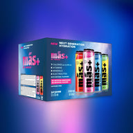 Box of "Más+ by Messi" hydration drink featuring four colorful cans on the front. The box highlights key features such as low calories, vitamins, minerals, electrolytes, natural flavors, and a caffeine-free formula. It contains 12 cans. The background displays a blue and purple gradient.