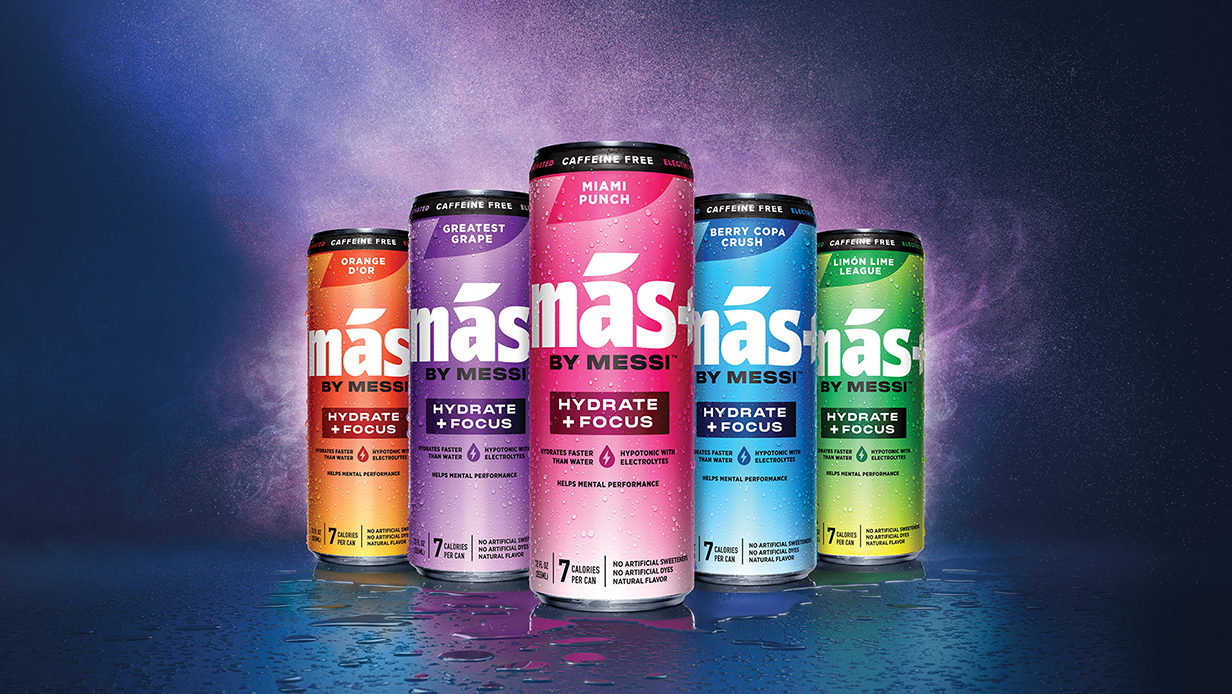 A full color line-up of five condensation-covered cans of Más+ by Messi hydration drink on a dark background.