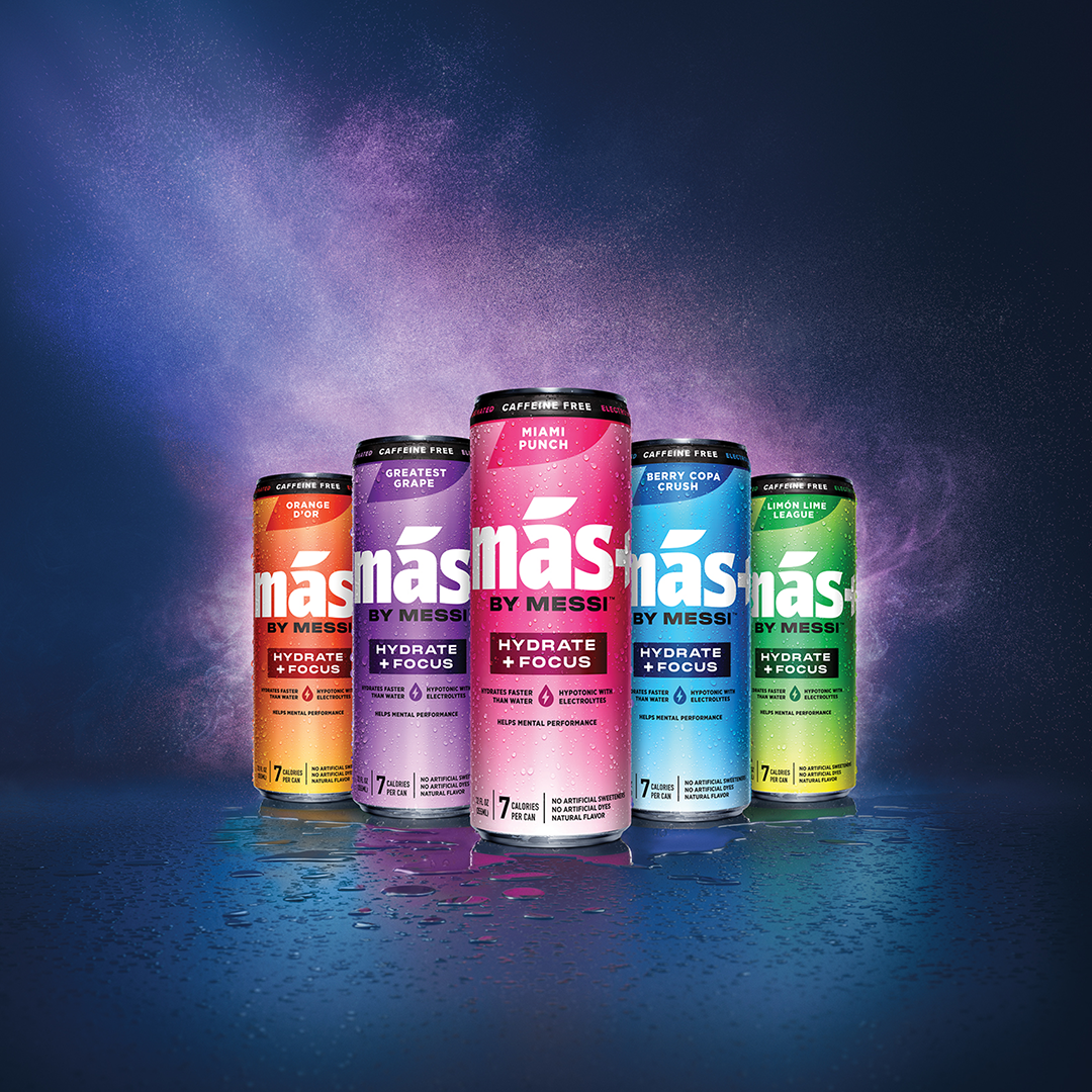 Five wet cans of Más+ by Messi hydration drink in a line, featuring all five flavors on a dark, wet surface