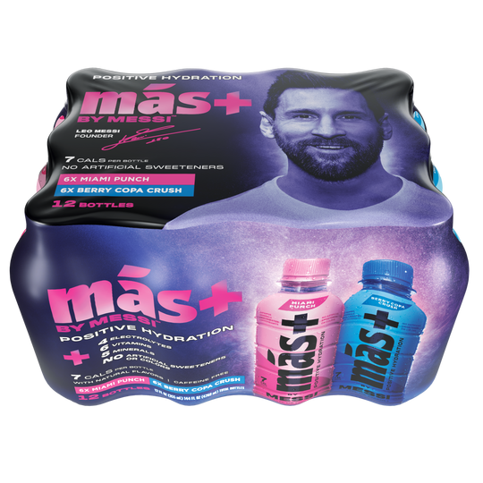 Top view of a más+ by Messi hydration drink 12-pack featuring two standout bottles—pink (Miami Punch) and blue (Berry Copa Crush). The packaging promotes benefits such as 7 calories, 6 essential vitamins, electrolytes, and no caffeine or artificial sweeteners. Set against a sleek black background, the bold and vibrant branding conveys energy, health, and high performance.