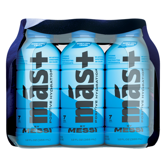 12-pack of más+ by Messi hydration drinks. The blue bottles feature bold black text that reads 'más+ Positive Hydration' and include key highlights such as 7 calories per bottle, no artificial sweeteners, and added electrolytes and antioxidants. Each bottle contains 12 fl oz (355 mL).