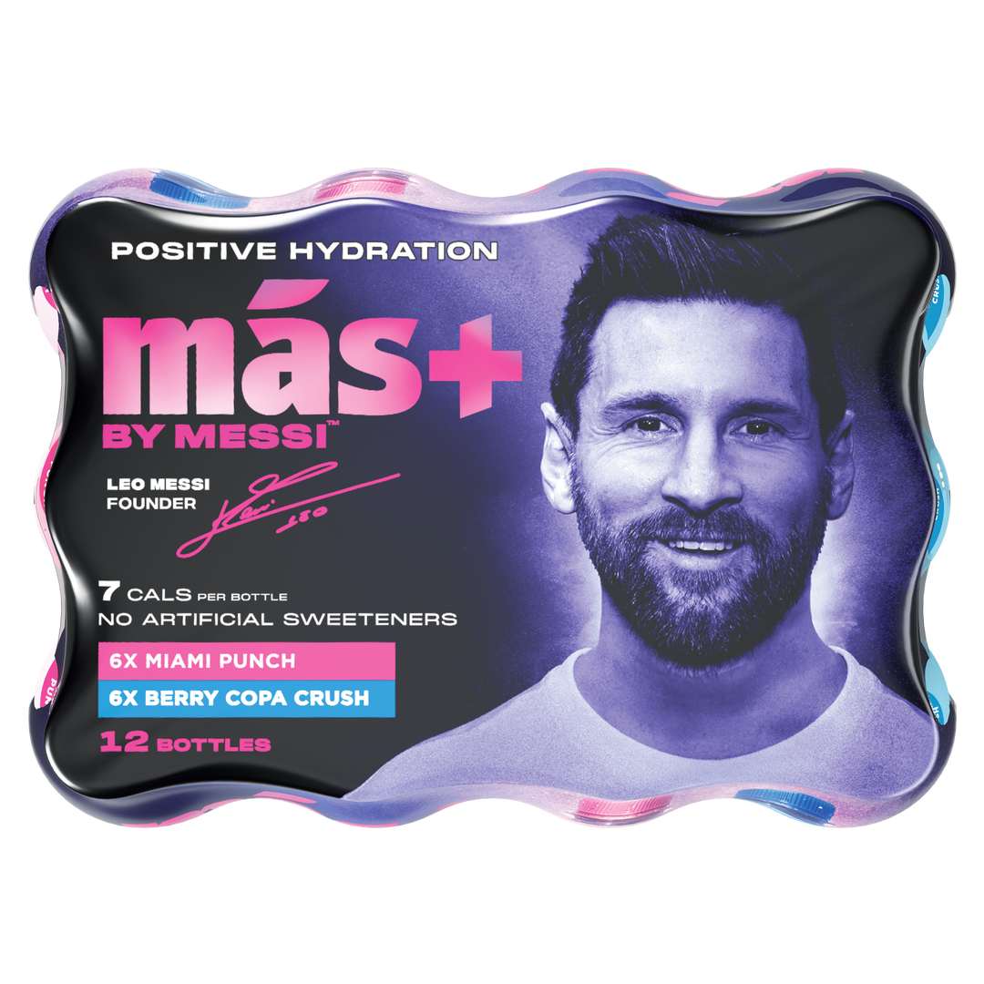 Packaging of 'más+ by Messi' hydration drink featuring Lionel Messi's portrait. The label highlights 'Positive Hydration' with 7 calories per bottle, no artificial sweeteners, and flavors including 6x Miami Punch and 6x Berry Copa Crush. The packaging contains 12 bottles.