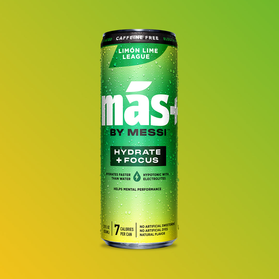 A single, condensation-covered can of MÁS+ by Messi 'Limón Lime League' hydration drink against a green and yellow gradient background.