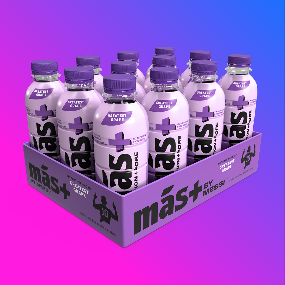 Pack of 12 Más by Messi Greatest Grape bottles on purple and pink background